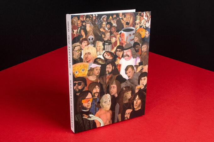 Hardcover Buch steht auf rotem Papier